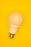 white light bulb on yellow surface