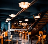 people sitting on chairs inside restaurant