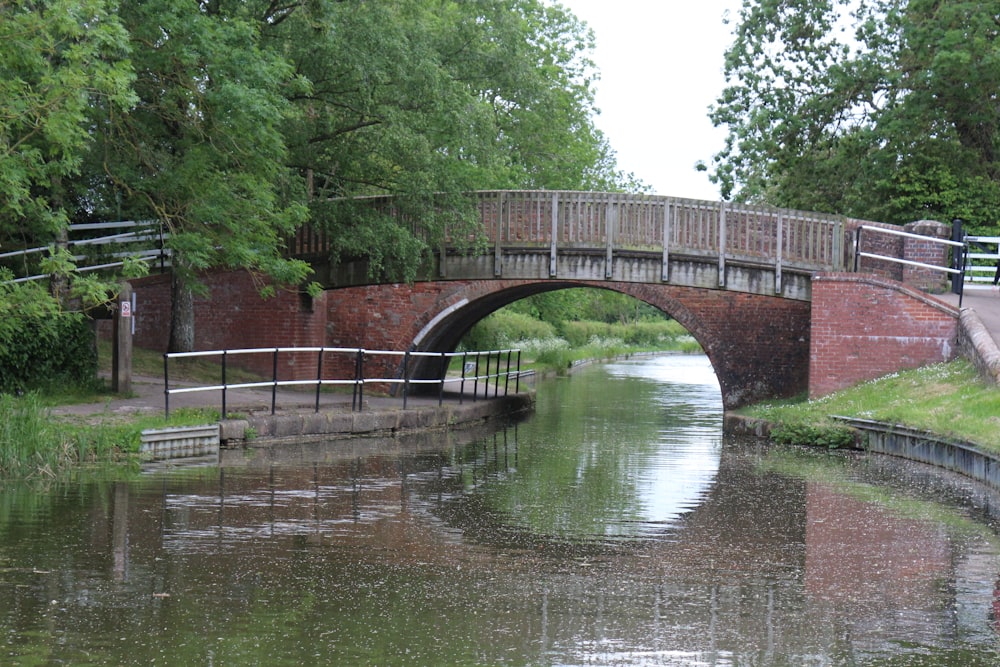 brown concrete bridge over river