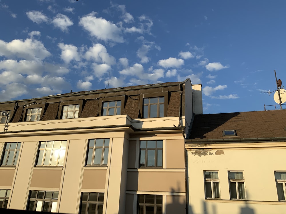 brown concrete building under blue sky during daytime