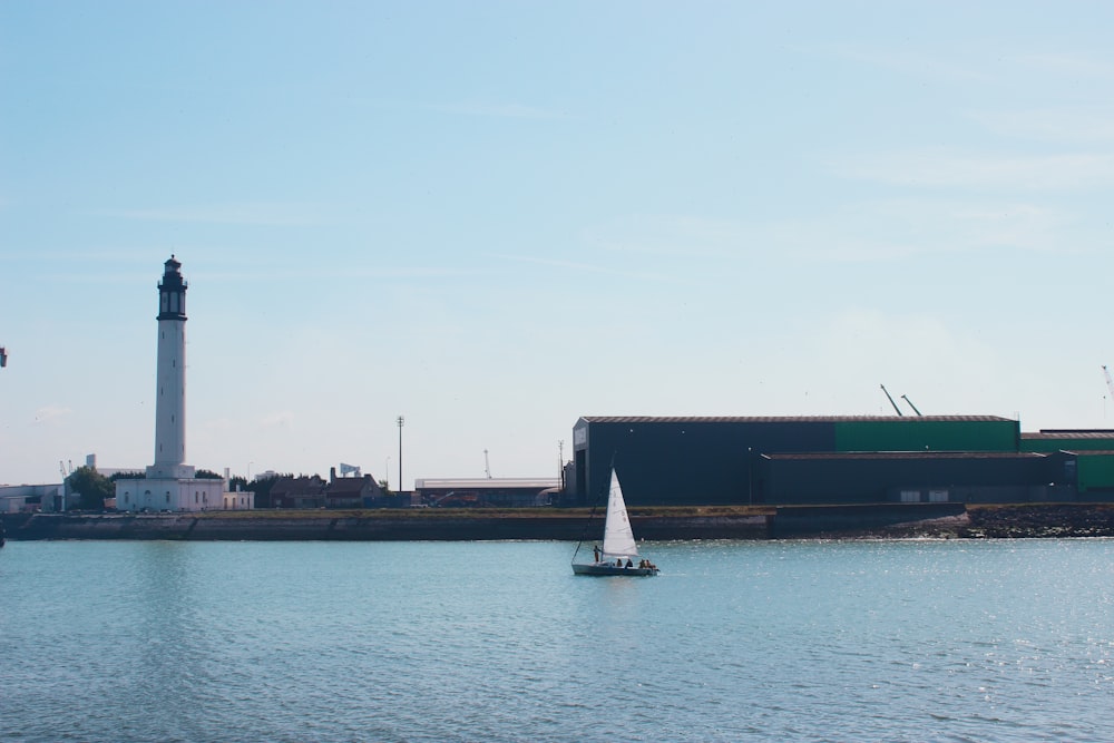 black and white boat on sea during daytime