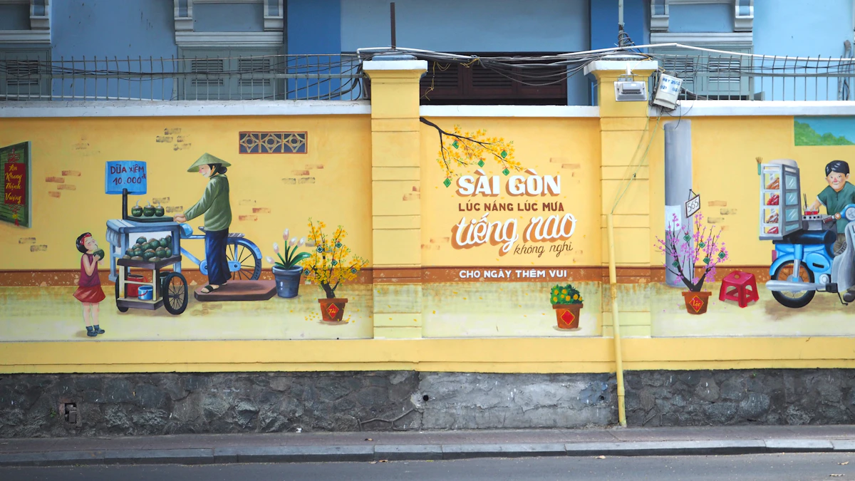 A yellow wall in Ho Chi Minh City painted with a colourful Sài Gòn street-life mural