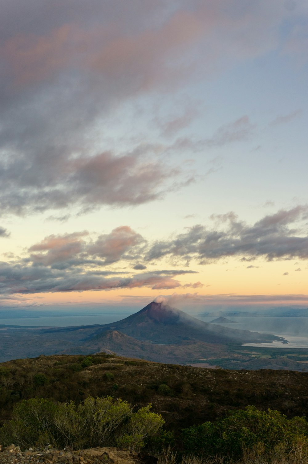 black mountain under white clouds during daytime