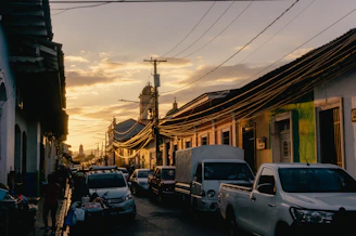 cars parked on side of road during daytime