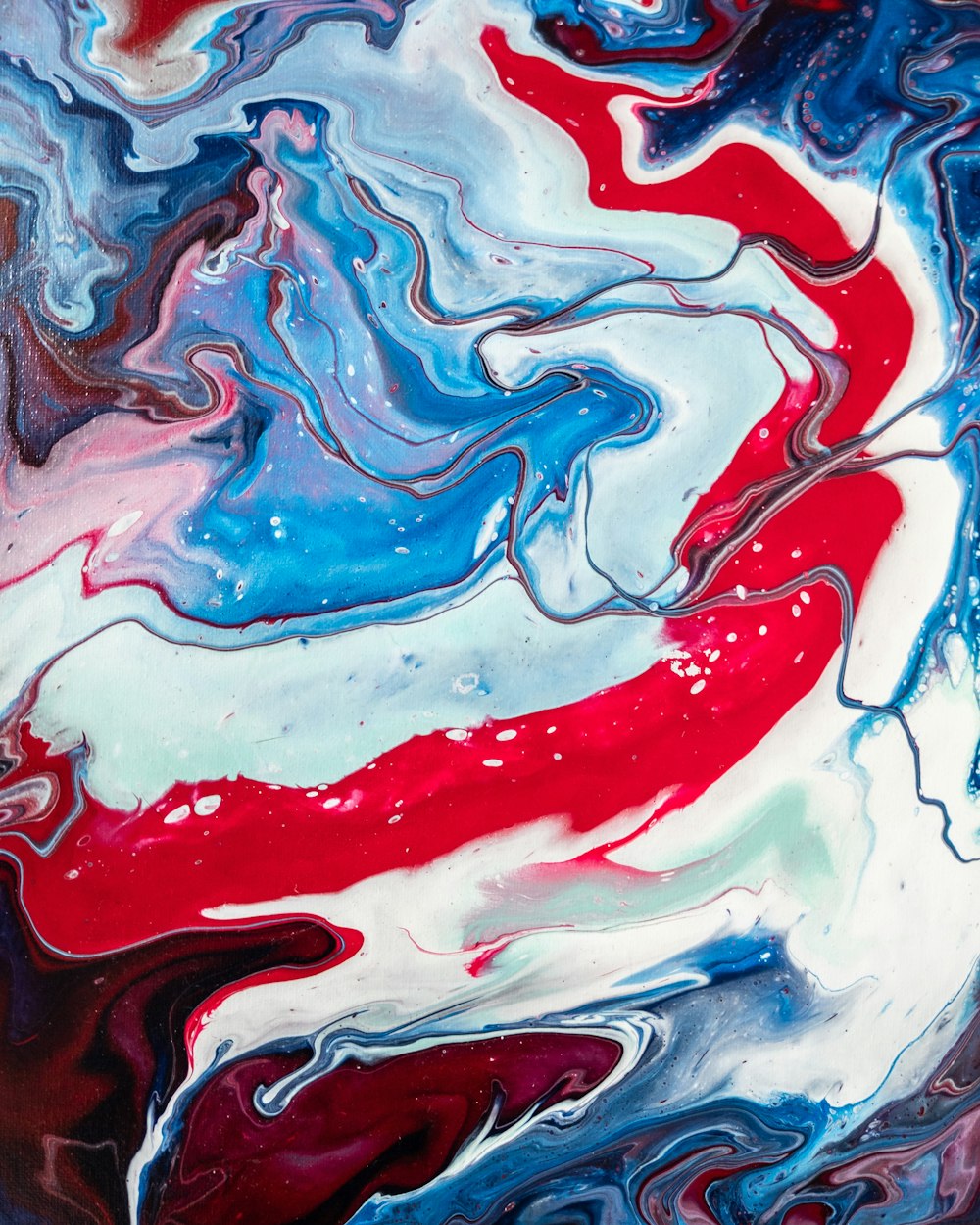 peinture abstraite rouge, blanche et bleue