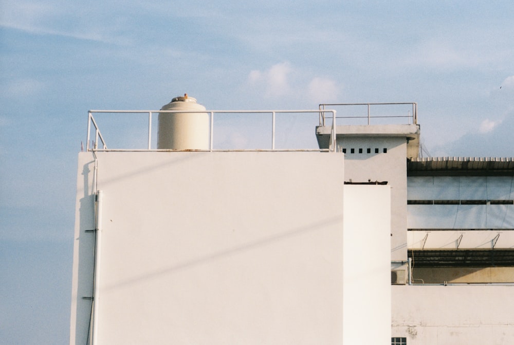 white concrete building under blue sky during daytime