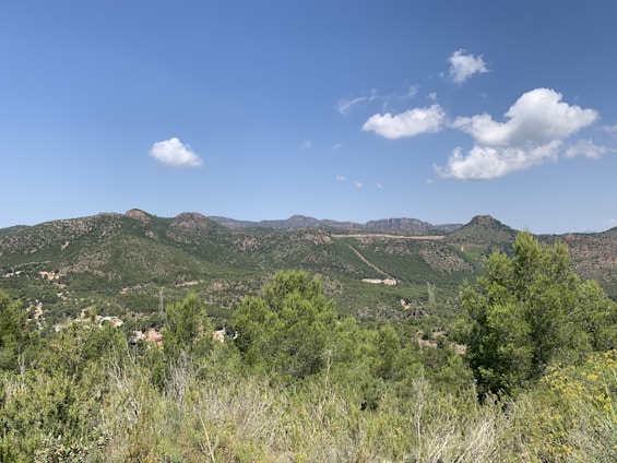 A scenic view of a popular travel destination with lush landscapes and clear blue skies.