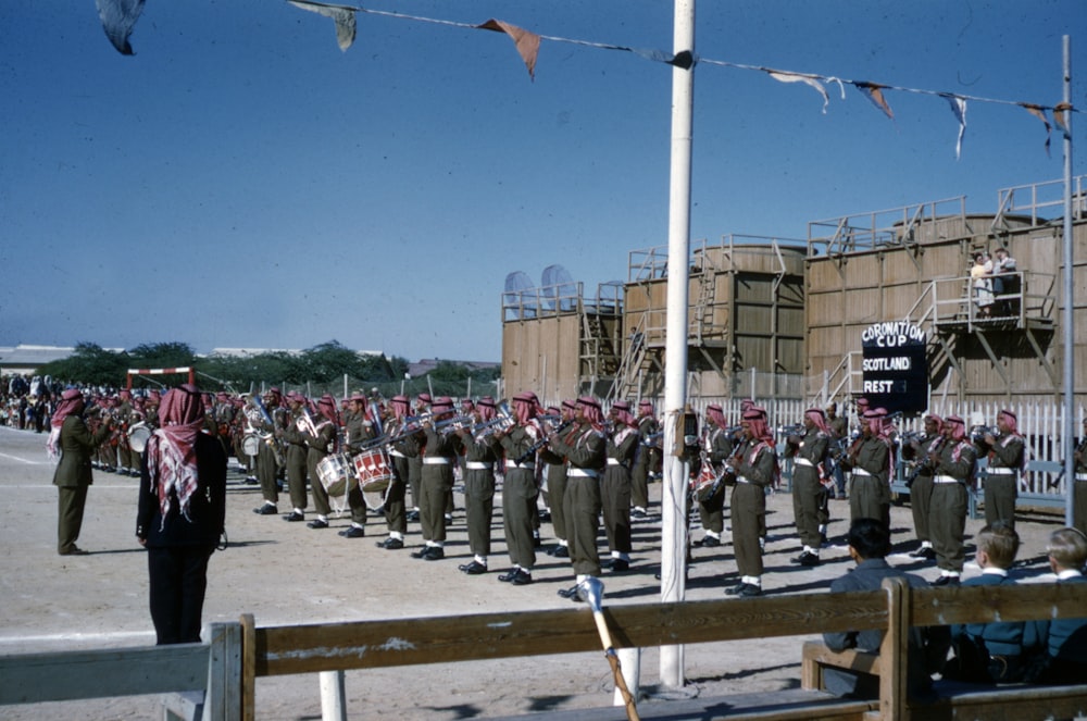 people standing on gray concrete pavement during daytime