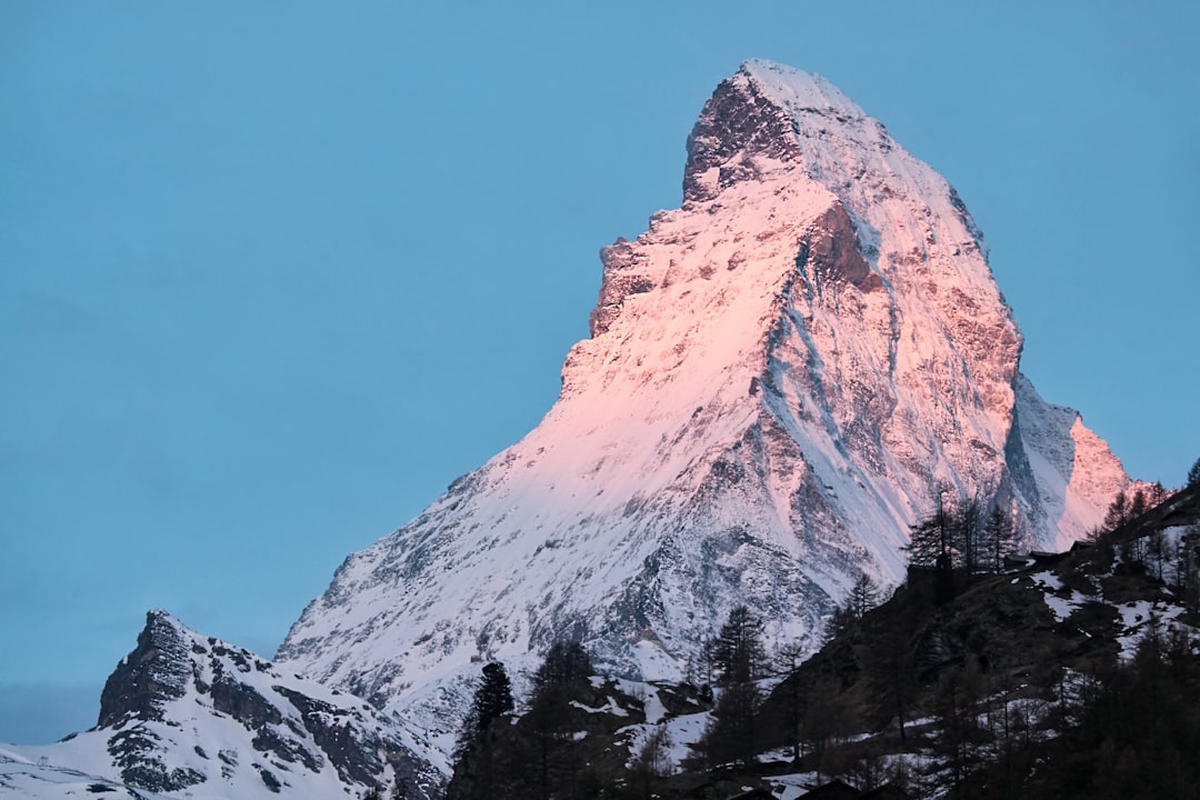 snow covered mountain under blue sky during daytime