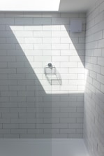 white ceramic bathtub with faucet