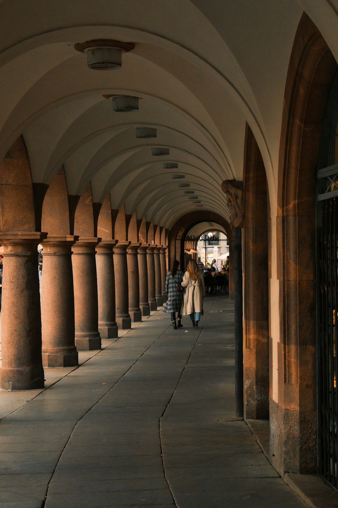 people walking on hallway during daytime