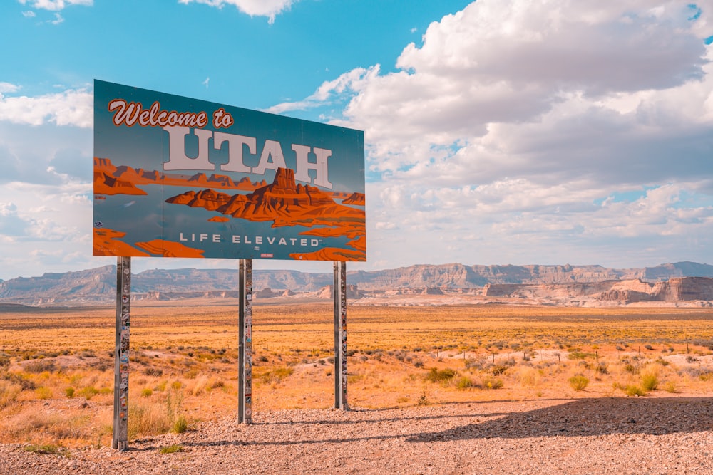 a welcome to utah sign in the desert