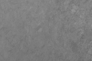 black textile on brown wooden table