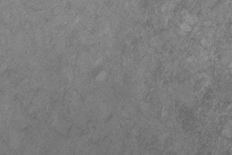 black textile on brown wooden table