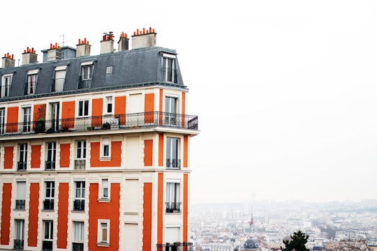 brown and black concrete building during daytime in Sacré-Cœur France