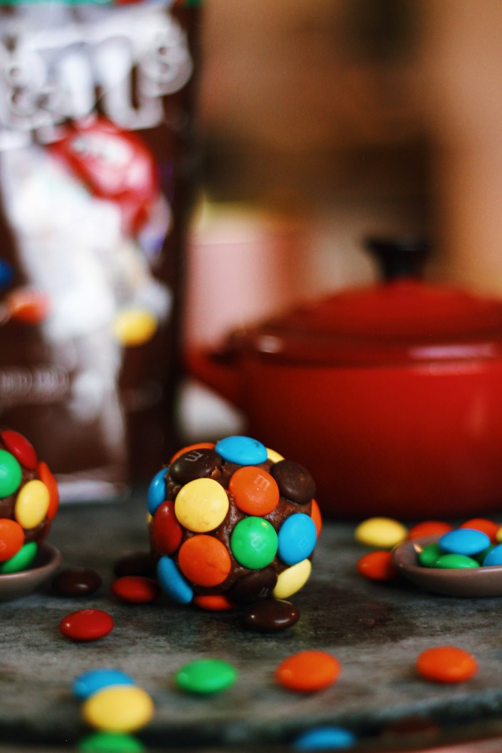 red ceramic bowl with m m s