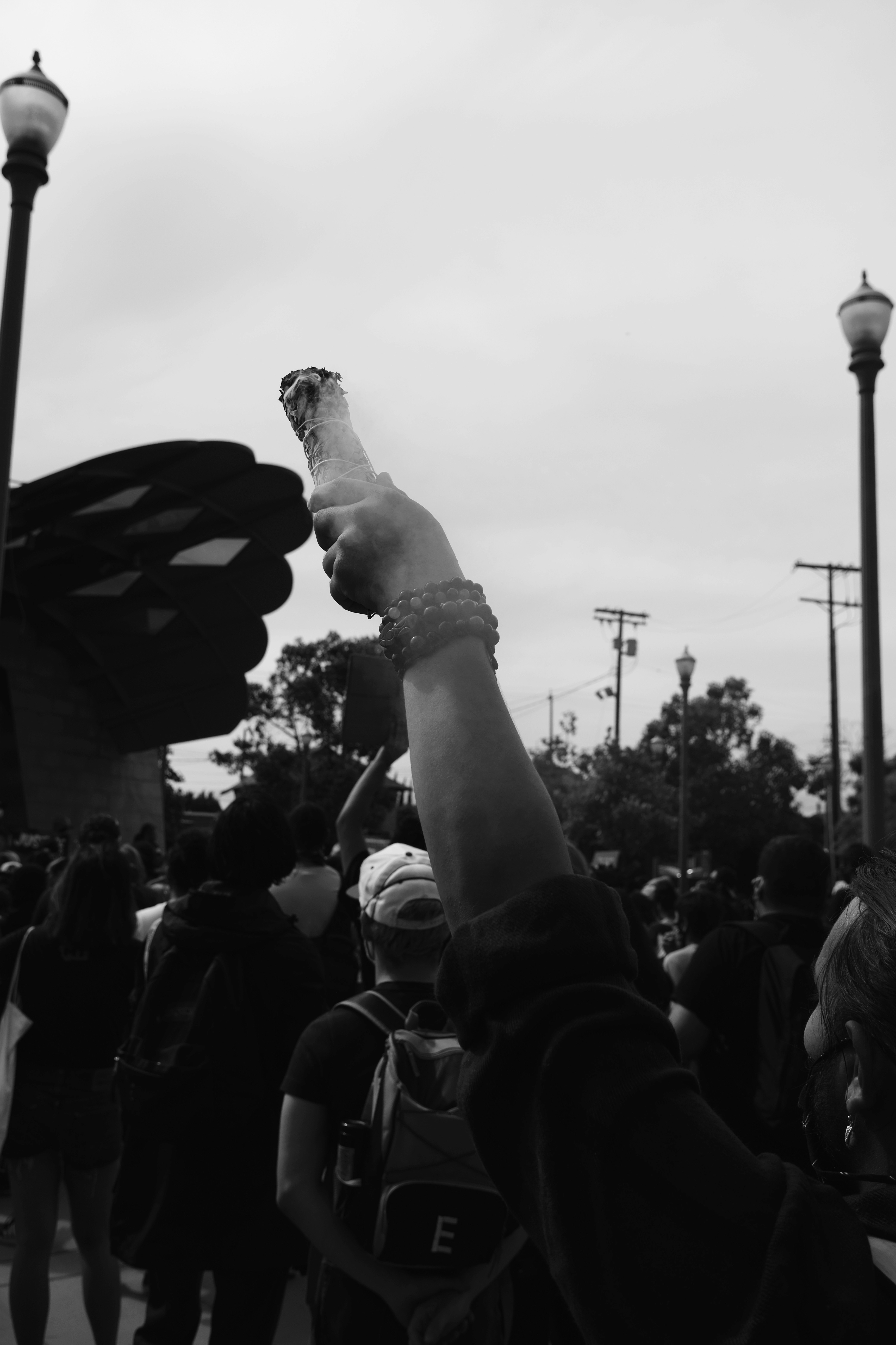 grayscale photo of people in a concert