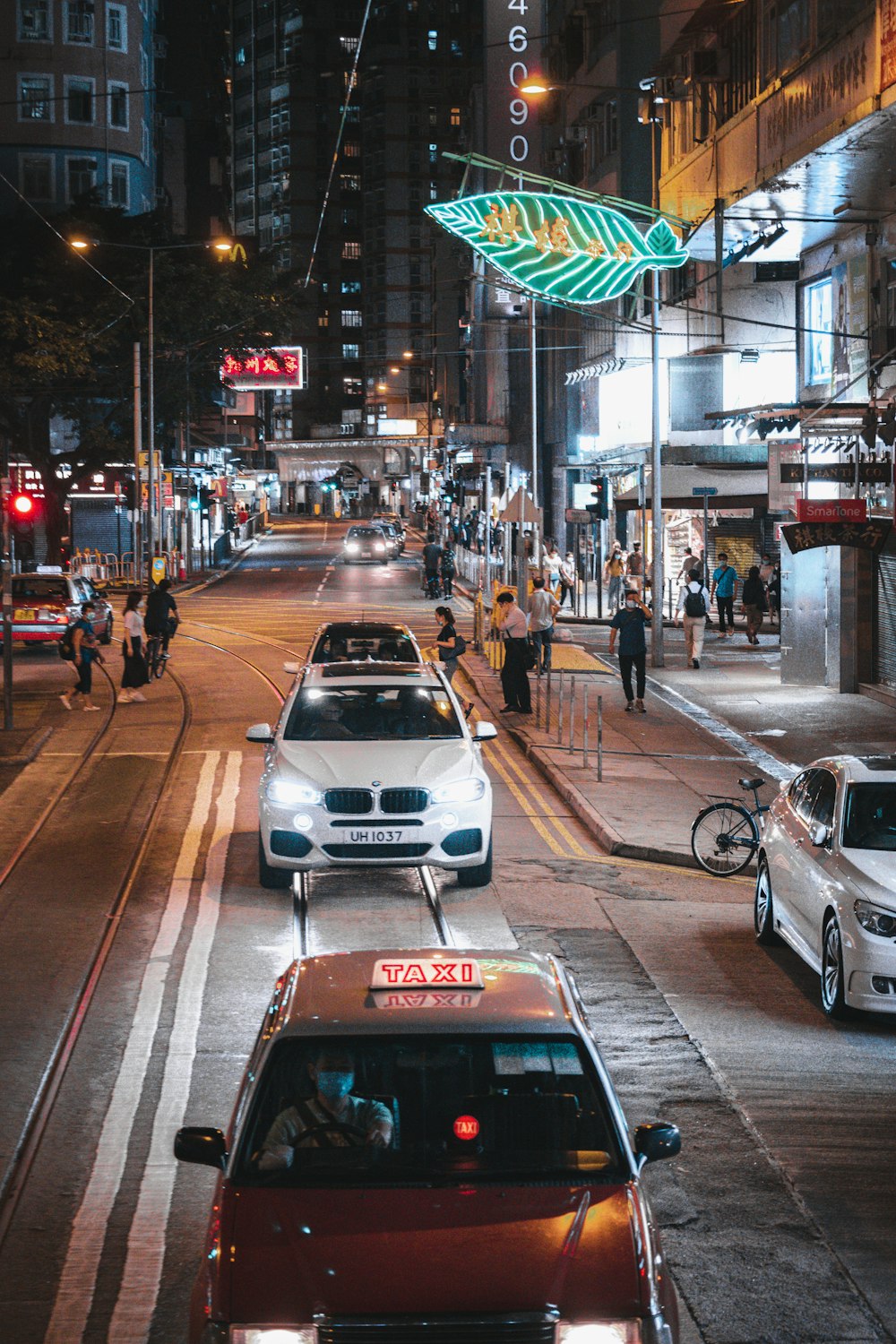 white and black car on road during daytime