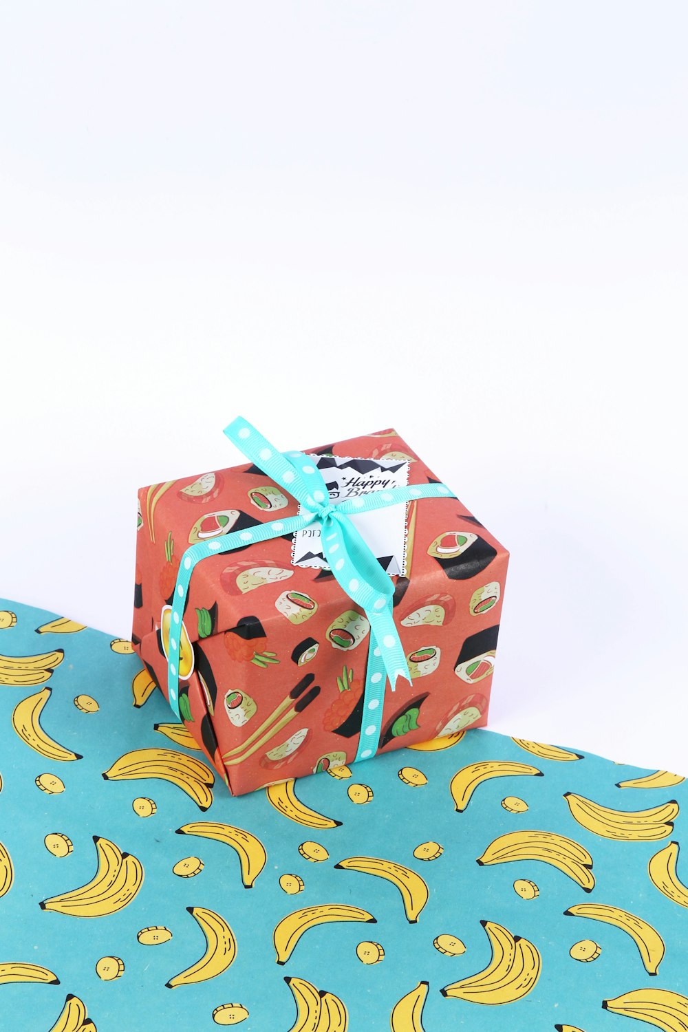 blue and white polka dot gift box
