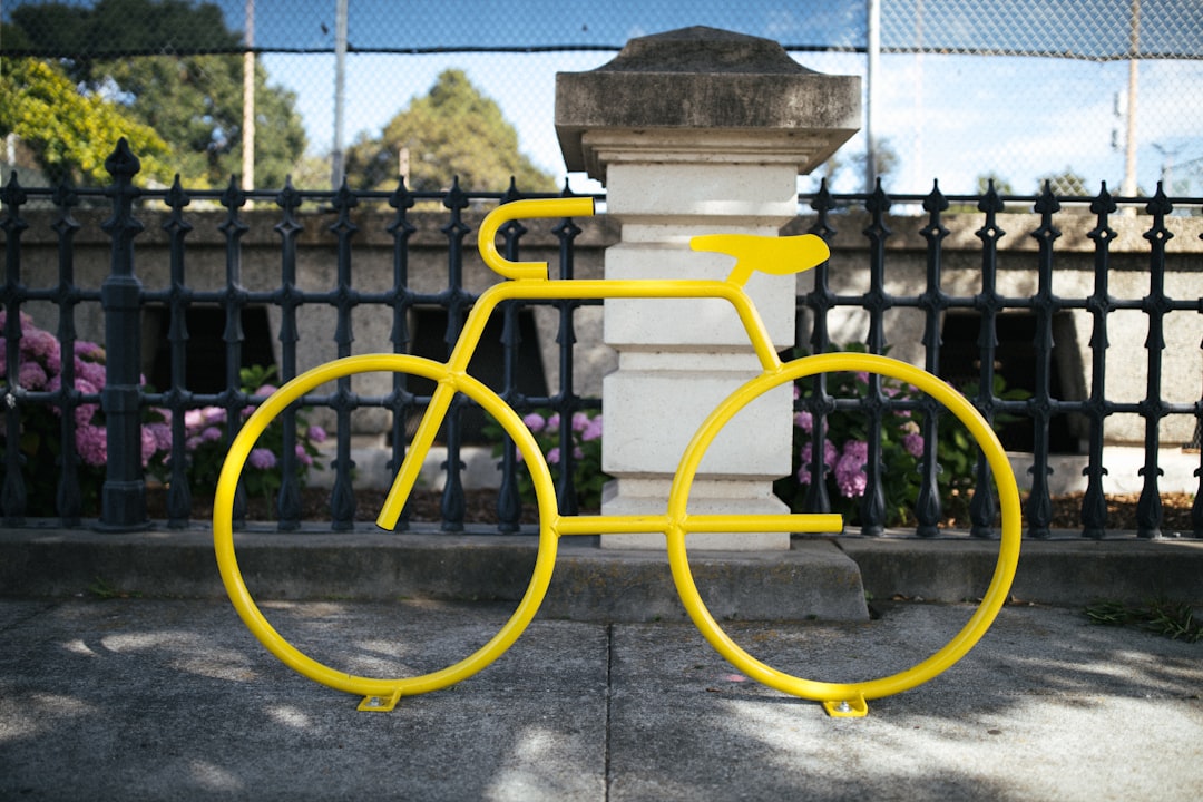 yellow metal railings on gray concrete floor