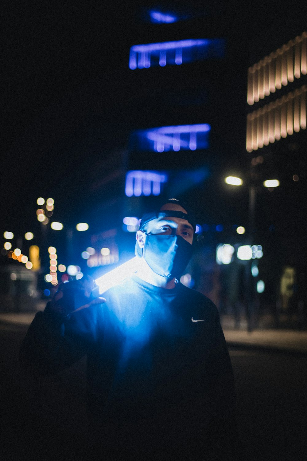 man in black jacket wearing black sunglasses