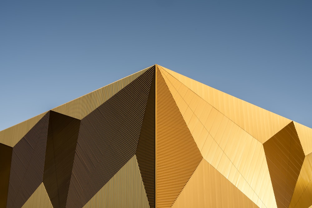 brown concrete building under blue sky during daytime