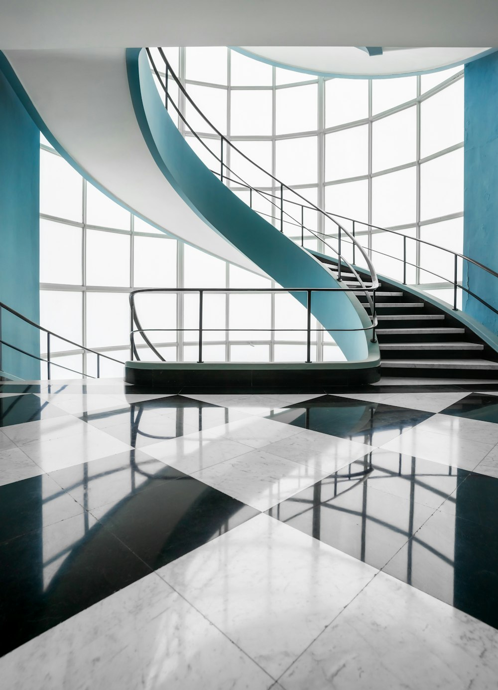 black metal spiral staircase inside building