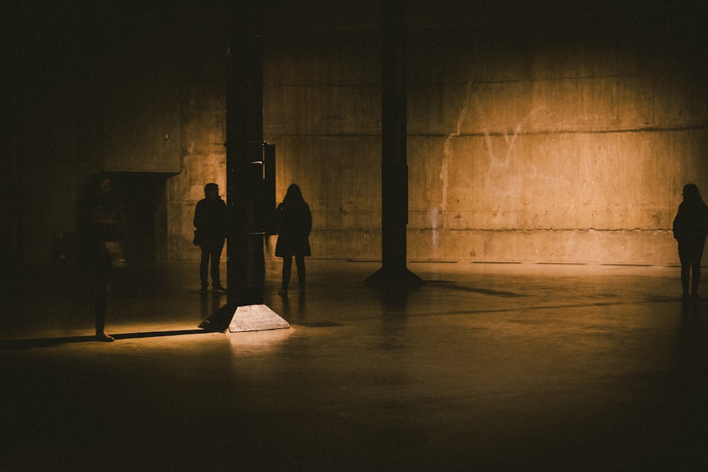 silhouette of person walking on hallway