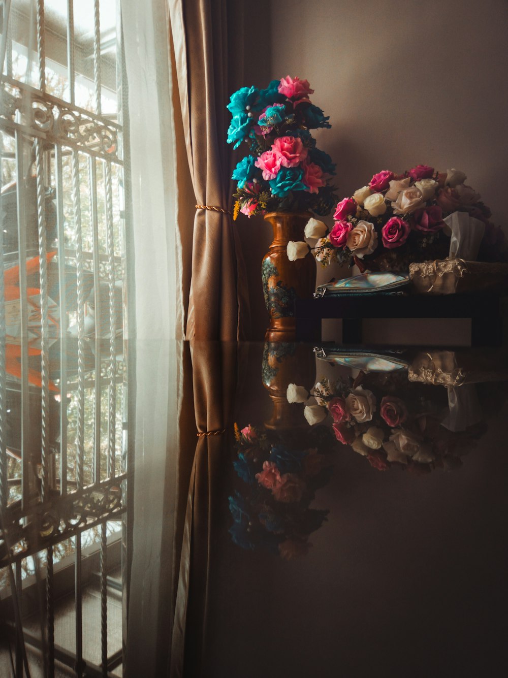 red and white roses bouquet on brown wooden shelf