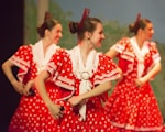 2 women in red and white dress