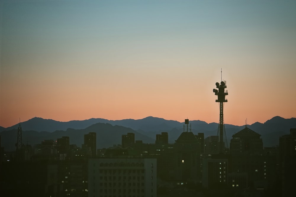 silhouette of cross during sunset