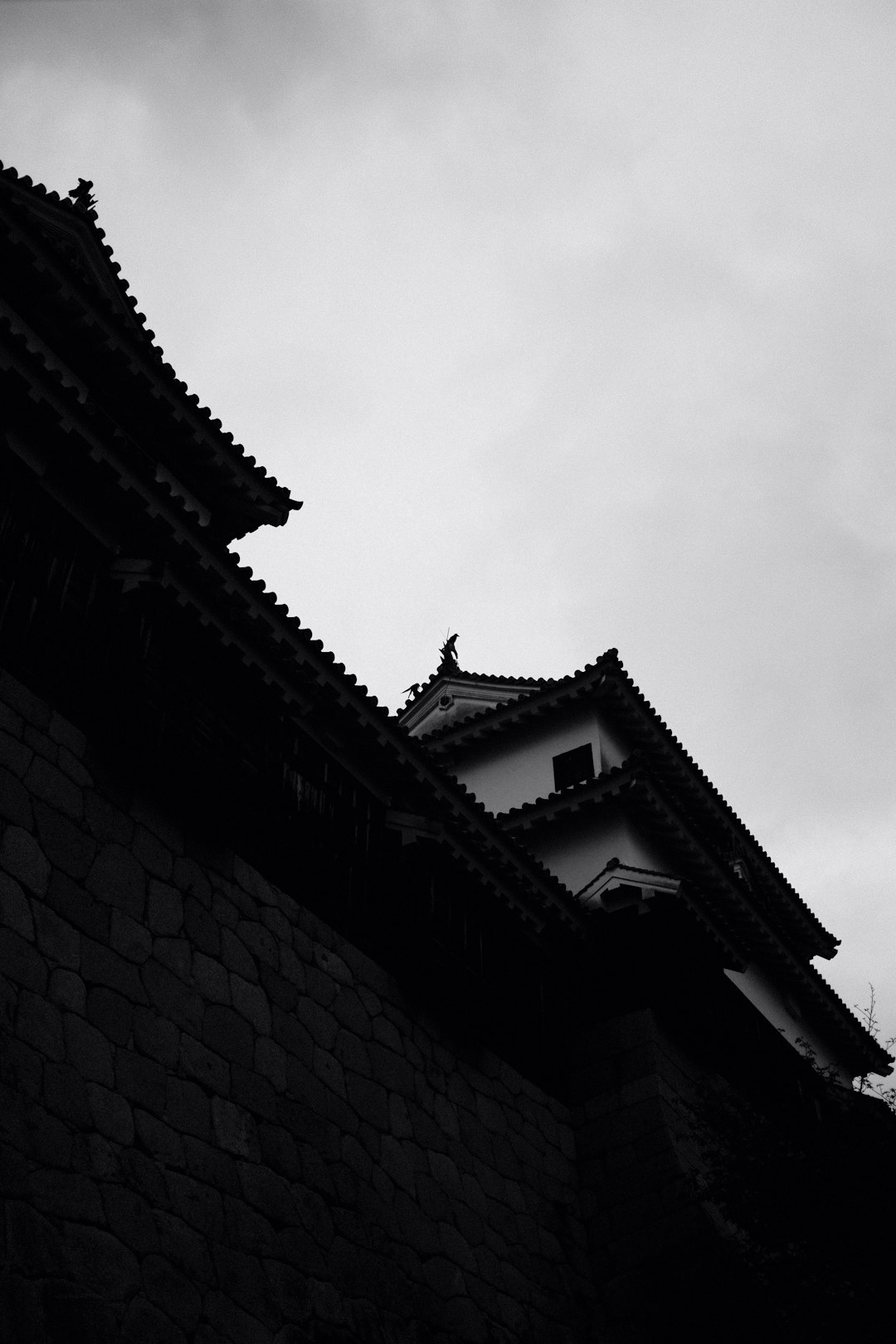 grayscale photo of concrete building