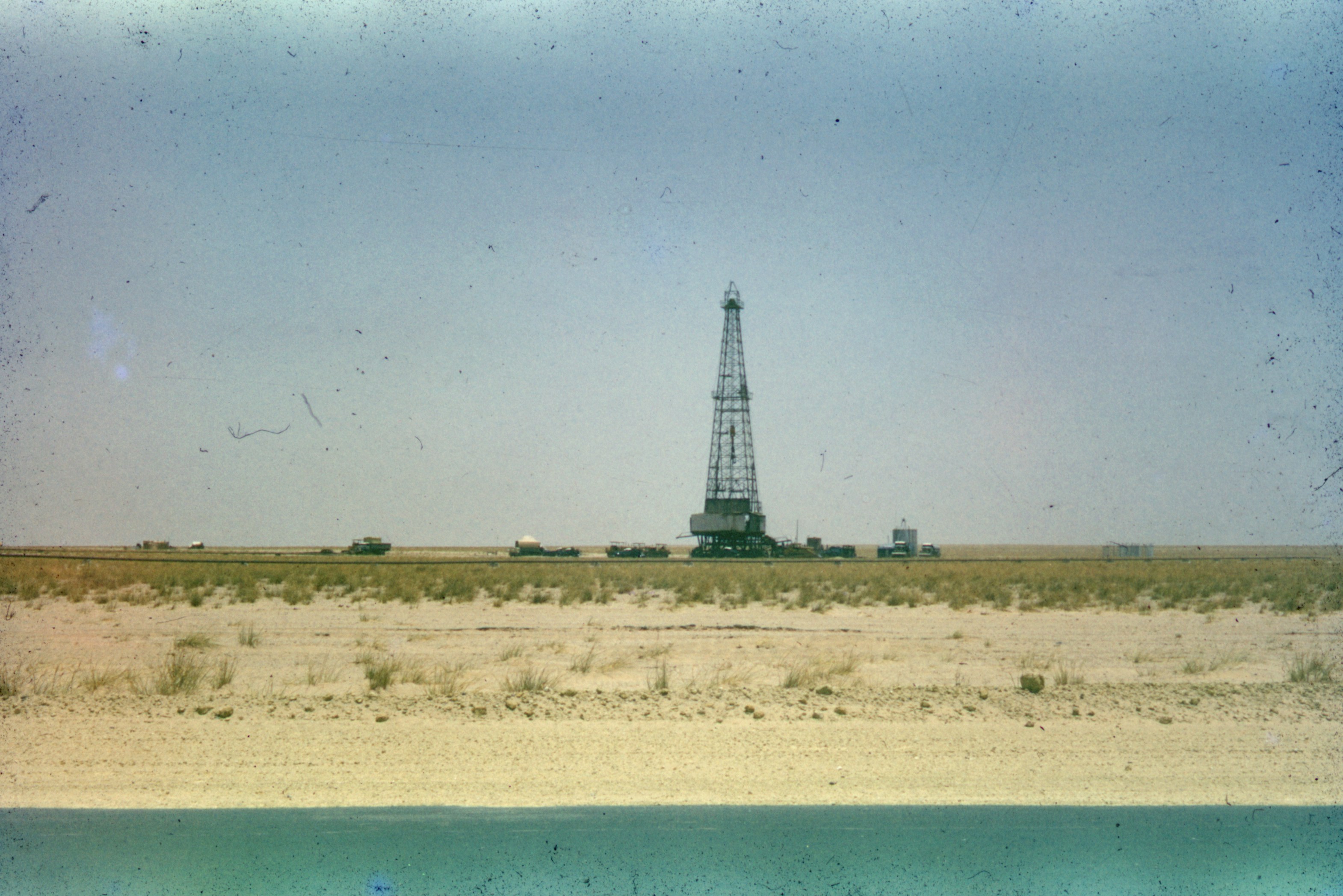 white and black tower under white sky during daytime