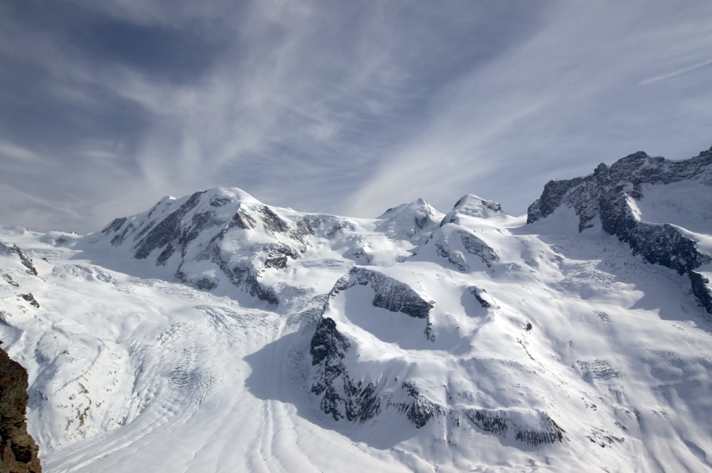 snow covered mountain under blue sky during daytime