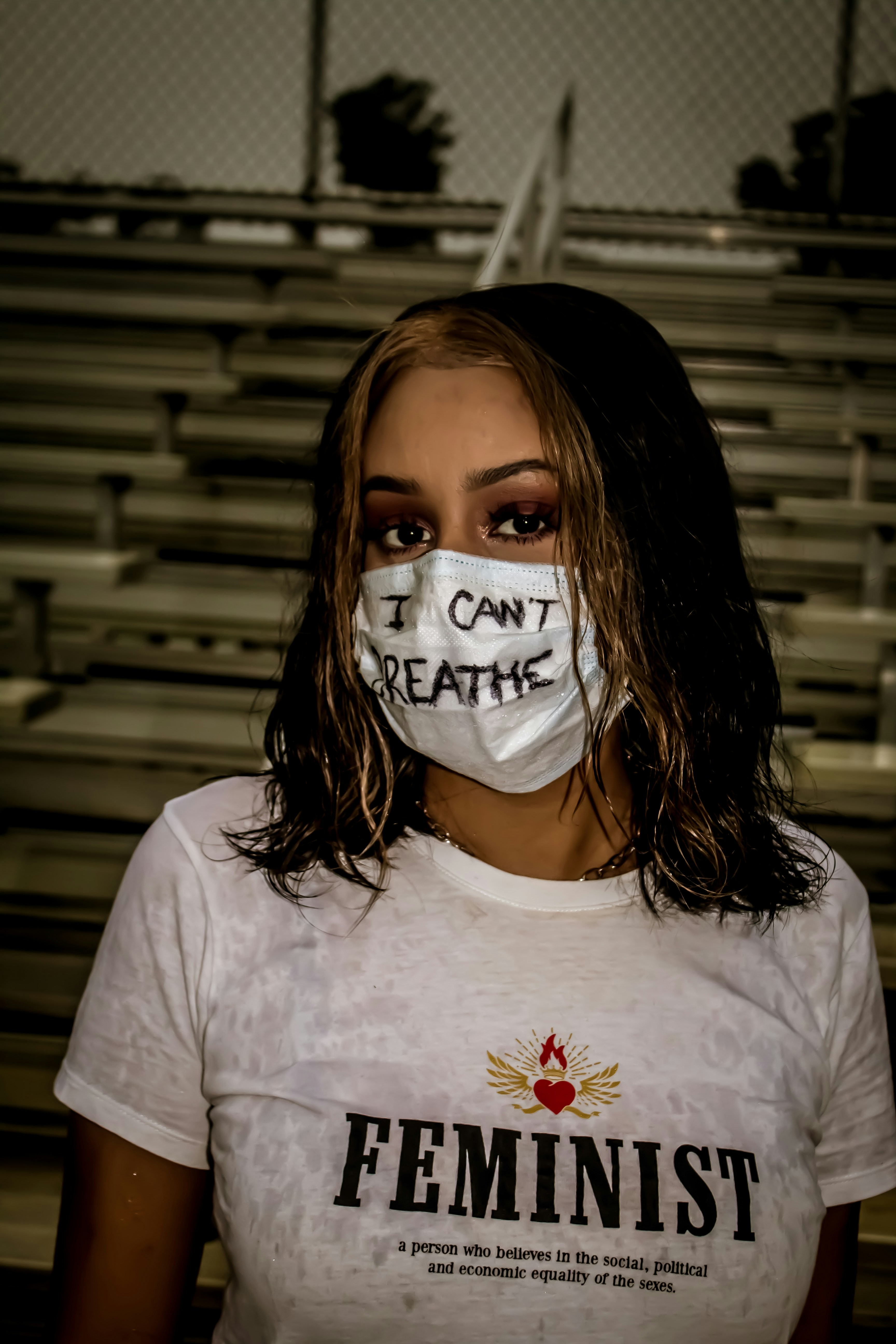 woman in white crew neck t-shirt with white face mask