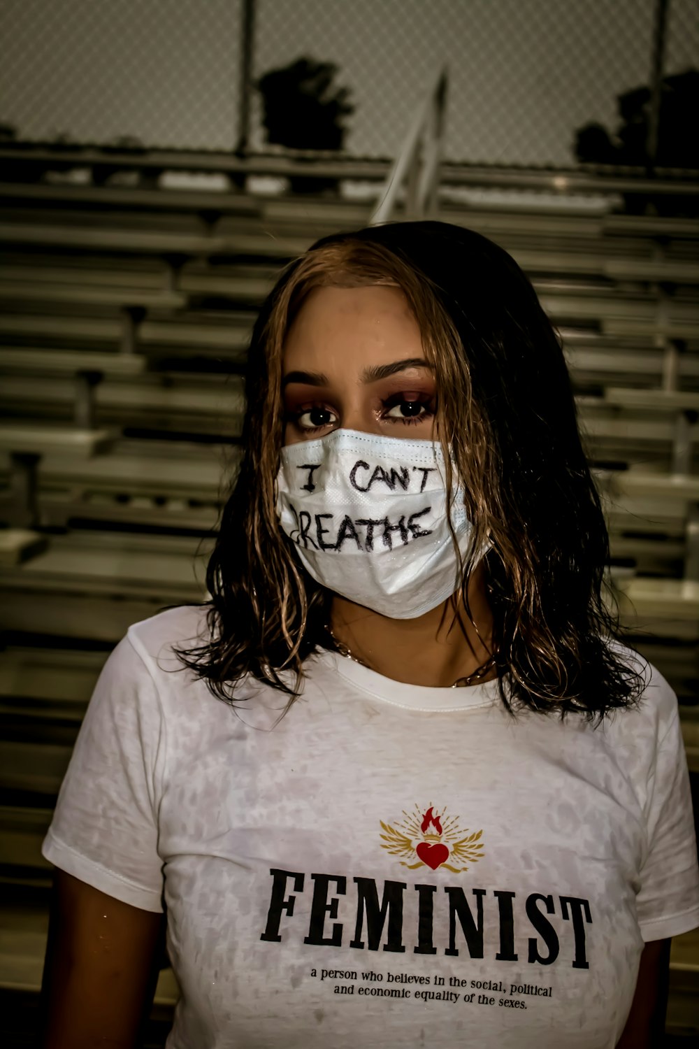woman in white crew neck t-shirt with white face mask