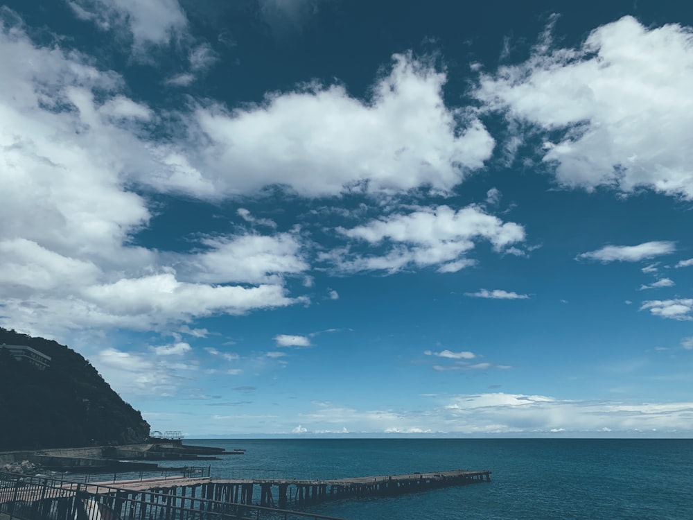 blue sky and white clouds over sea