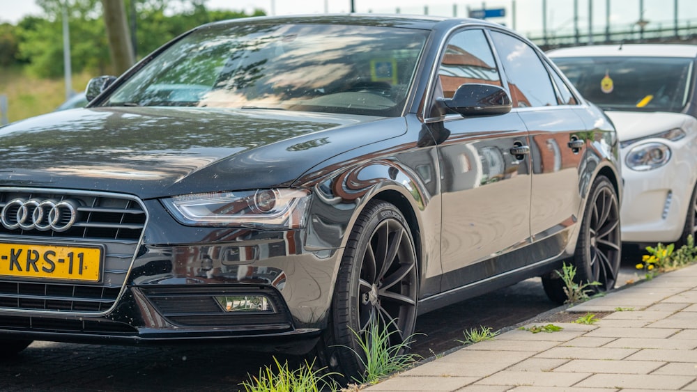 silver mercedes benz sedan parked on gray concrete pavement during daytime