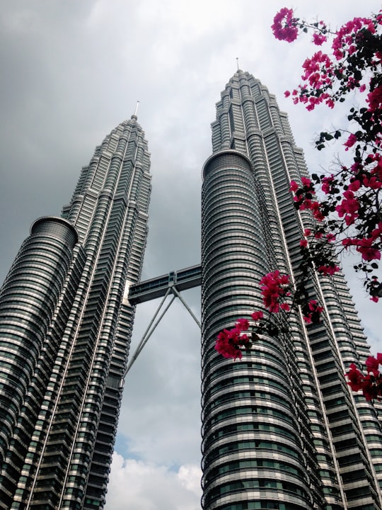 low angle photography of high rise building in Petronas Twin Towers Malaysia