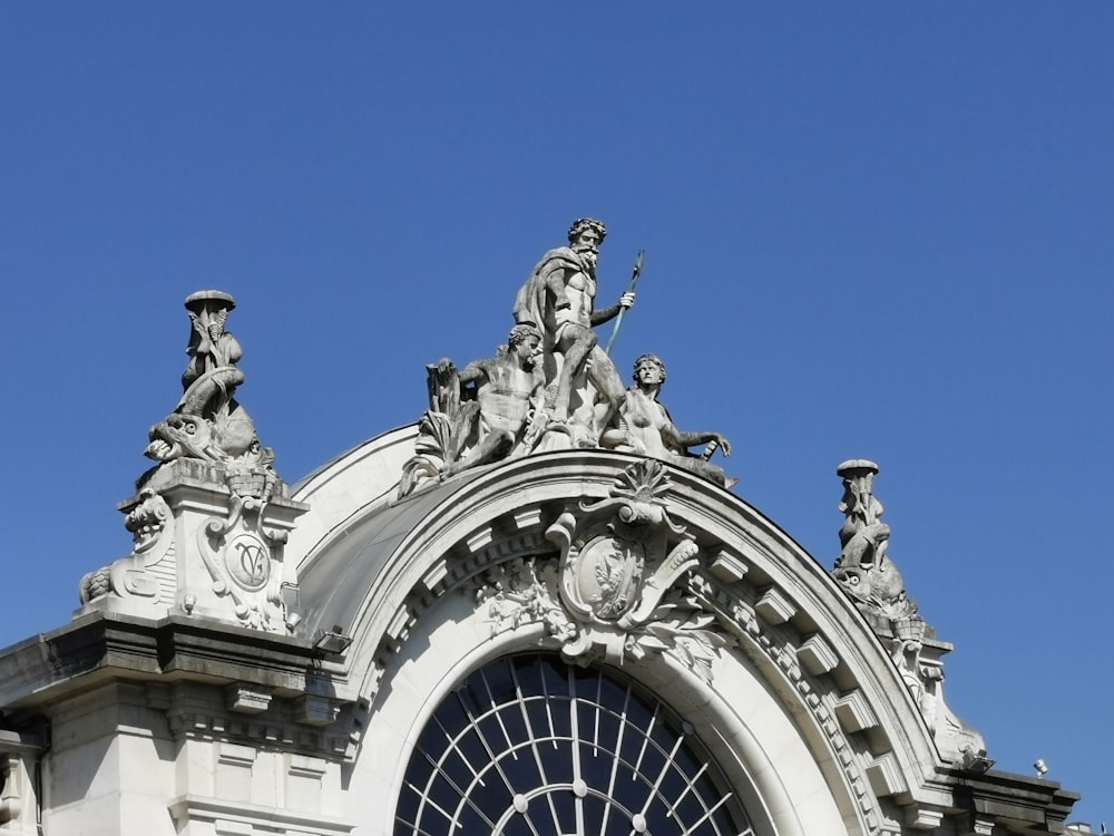 white concrete building under blue sky during daytime