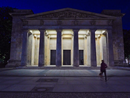 people walking in front of white concrete building during daytime in Lustgarten Germany