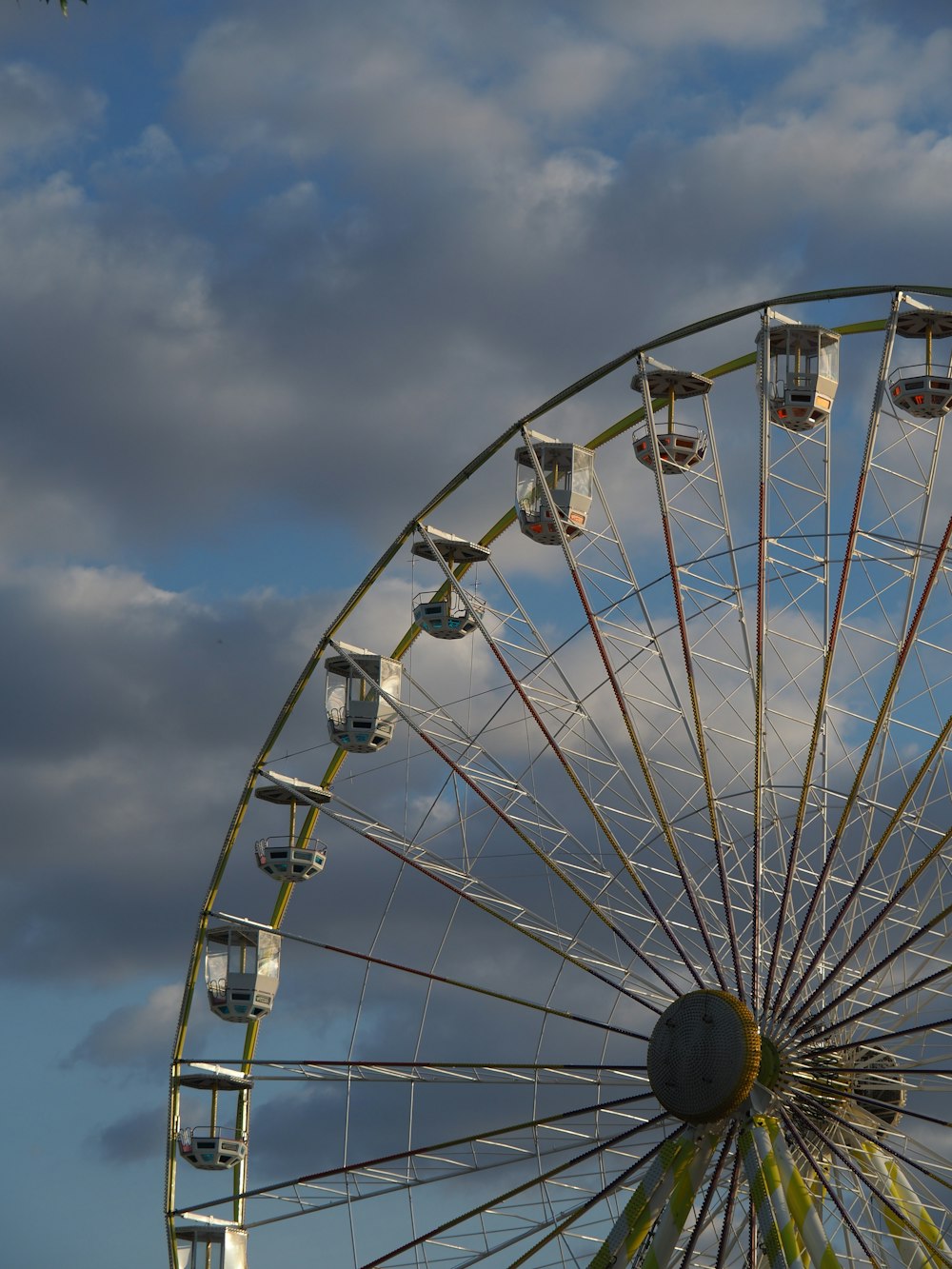 white ferris wheel under blue sky during daytime