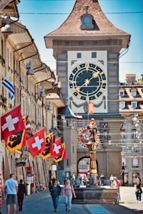 brown and white concrete building with flag of united kingdom