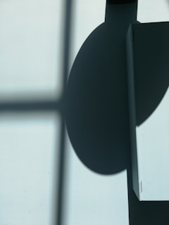 A bold geometric piece that plays with light and shadow.