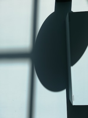 An abstract play of shadows and light on textured surfaces.