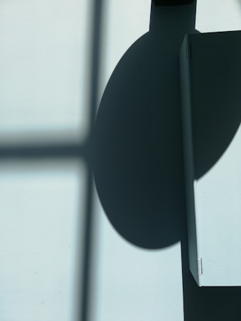 A bold geometric piece that plays with light and shadow.