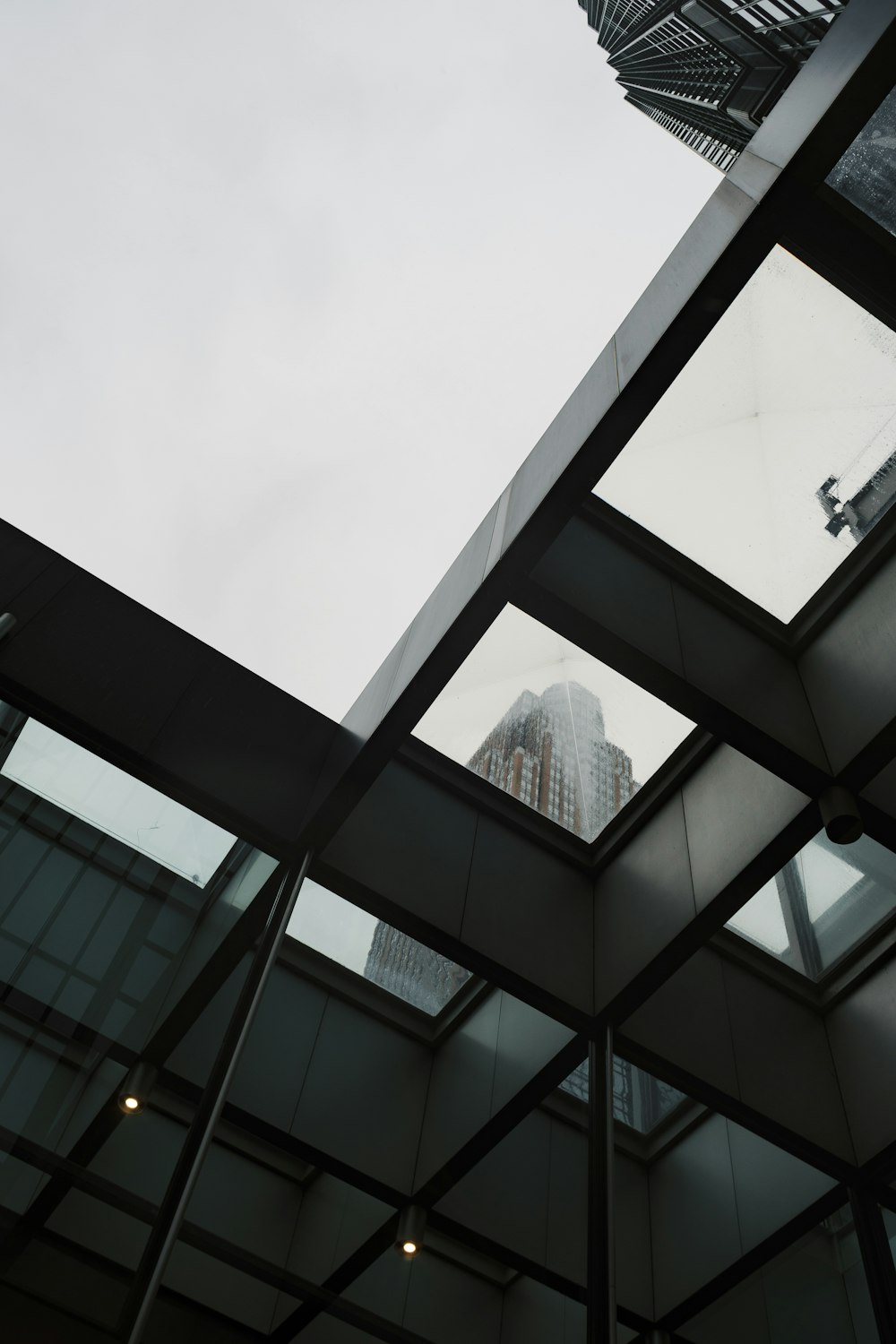 low angle photography of glass building