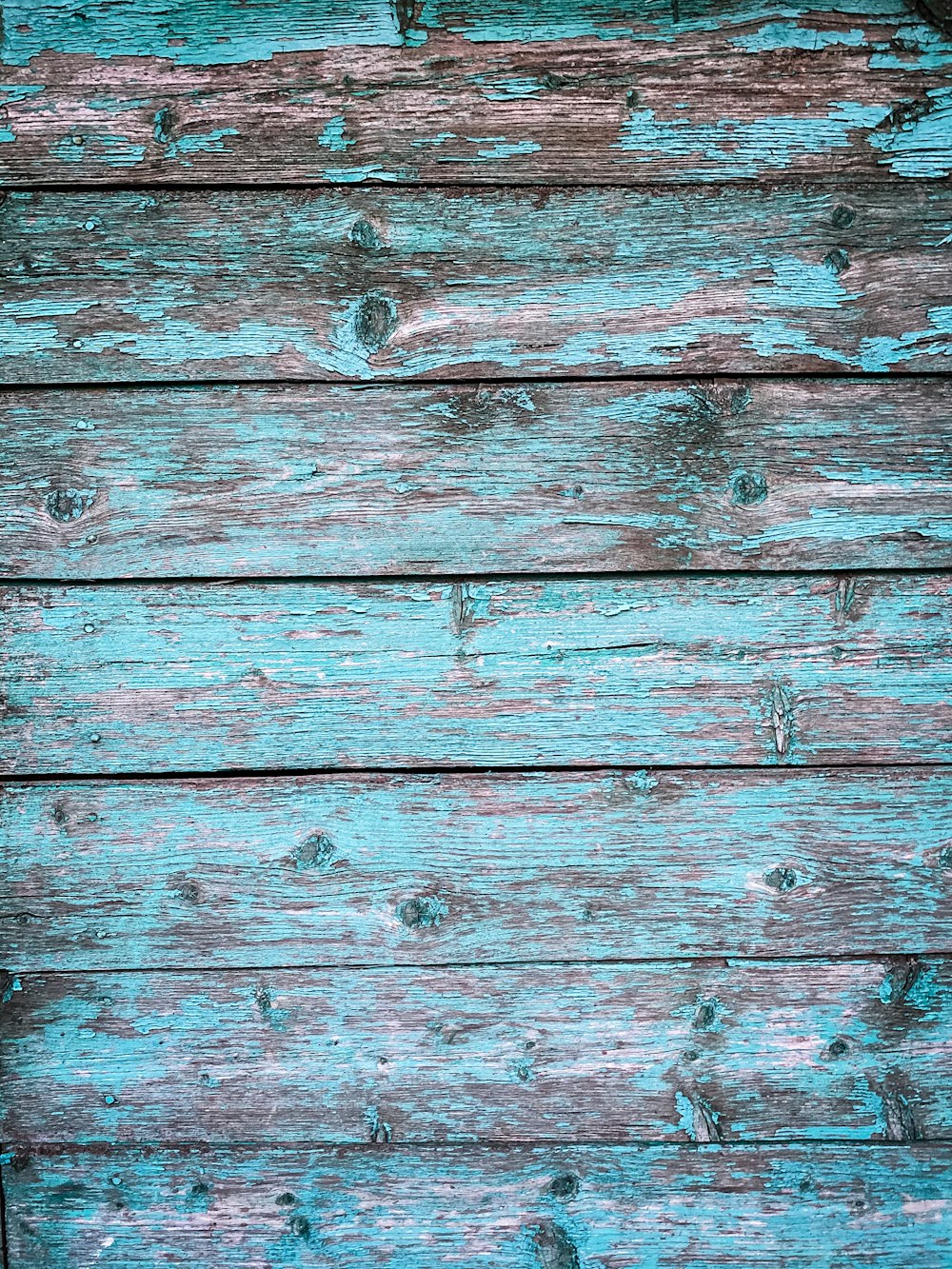 brown wooden surface with white paint