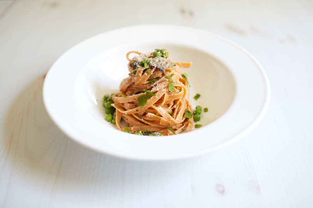 pasta dish on white ceramic plate