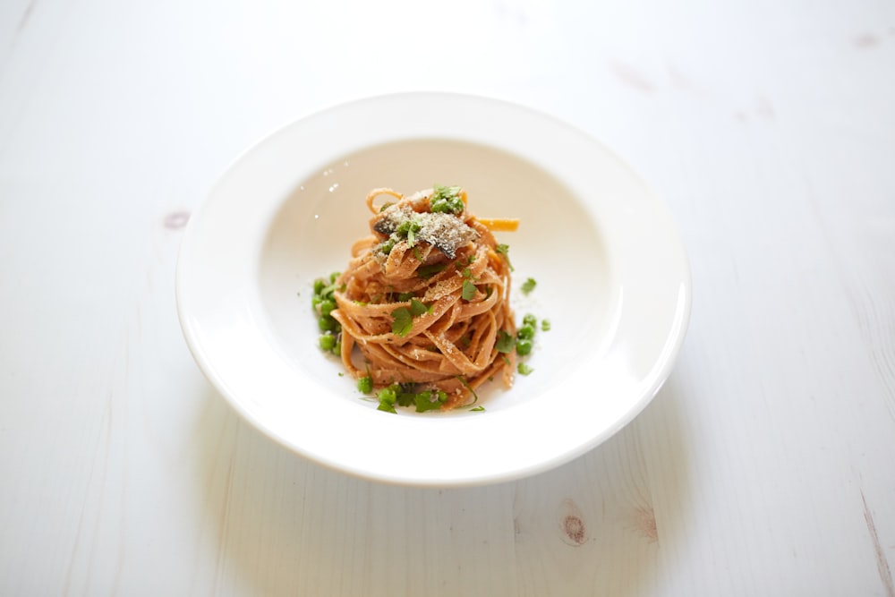 pasta dish on white ceramic plate